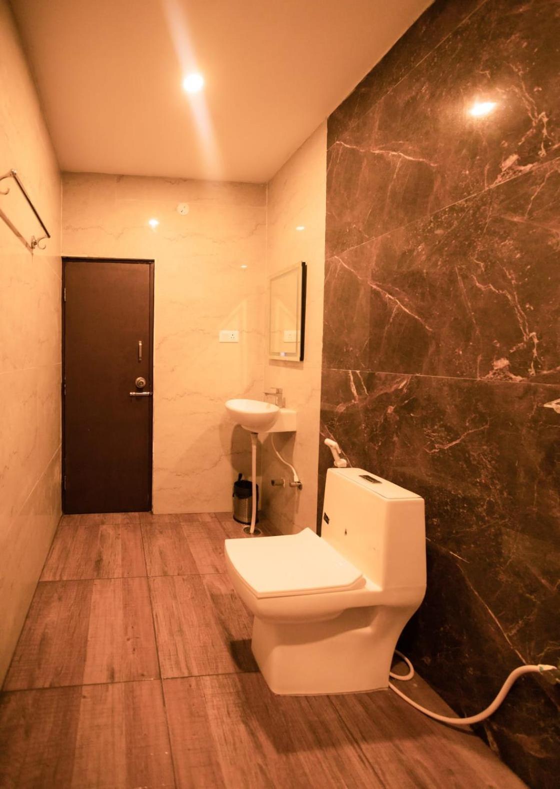 Beestay Hotels Elite Park Тирупати Номер фото